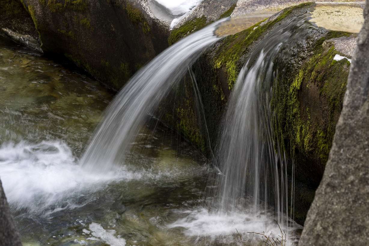 Runoff water flows down Little Cottonwood Creek from the Wasatch Mountains in Little Cottonwood Canyon on Tuesday, March 15, 2022.
