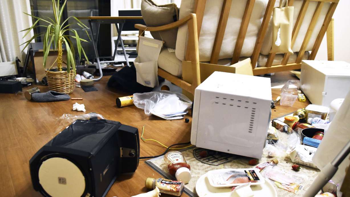 Furniture and electrical appliances are scattered at an apartment in Fukushima, northern Japan, on Wednesday, following an earthquake. A powerful earthquake shook off the coast of Fukushima, triggering a tsunami advisory.