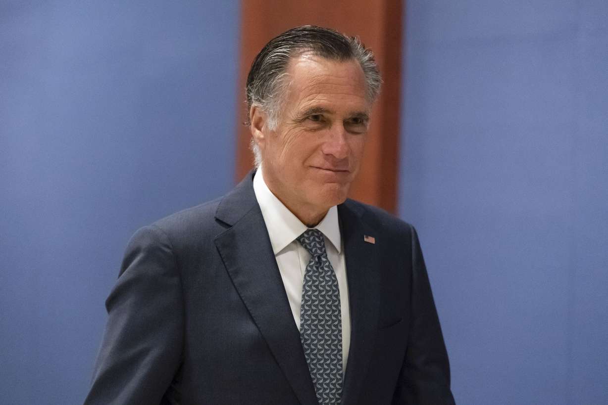 Sen. Mitt Romney, R-Utah, arrives to watch a speech by Ukrainian President Volodymyr Zelenskyy live-streamed into the U.S. Capitol, in Washington on Wednesday. Zelenskyy has been pleading with the U.S. for military support against Russia’s crushing invasion.