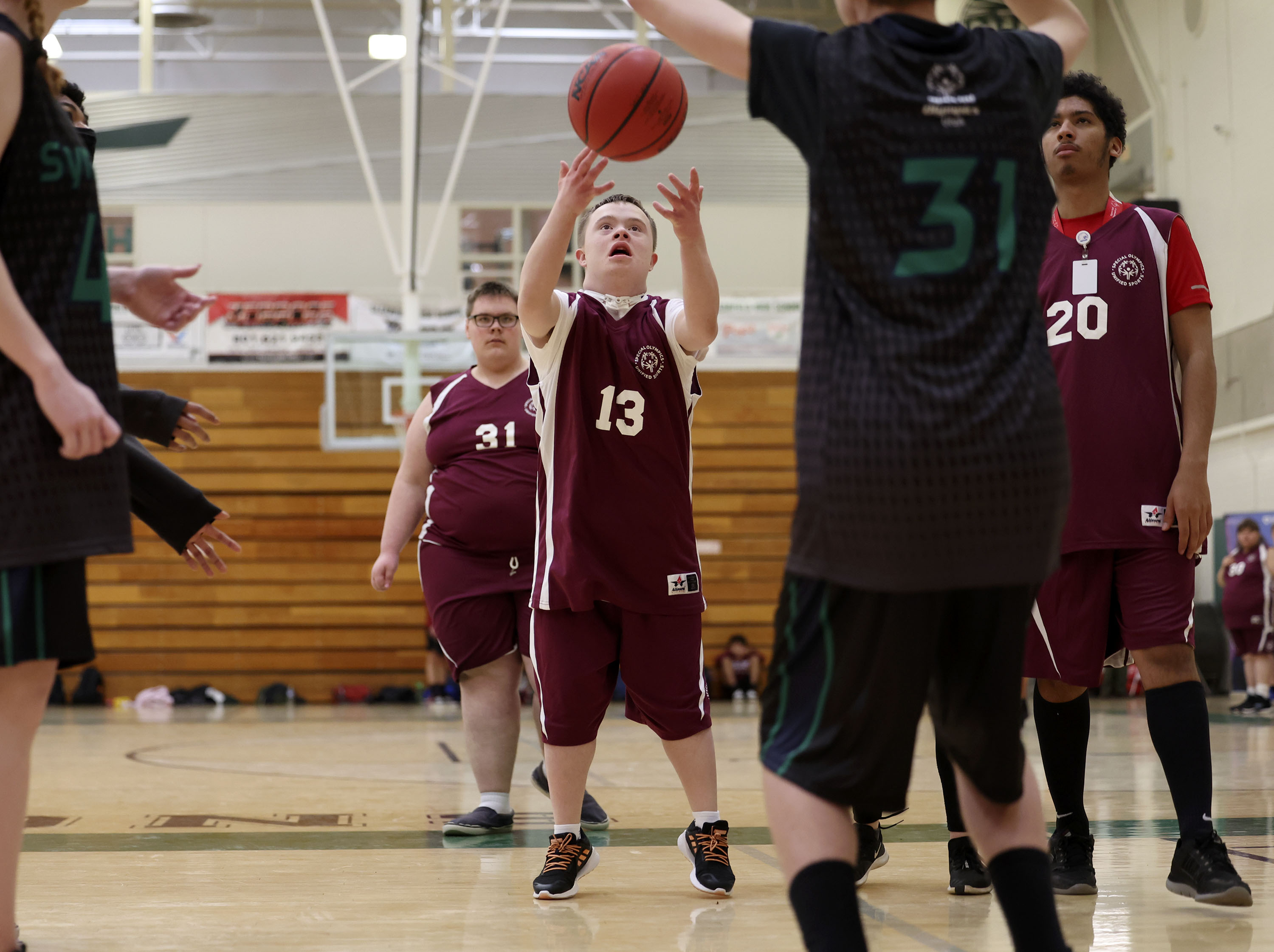 Northridge Knights’ Spencer Cannon shoots during the Special Olympics Utah Unified Sports tournament at Clearfield High School on Wednesday, March 16, 2022.