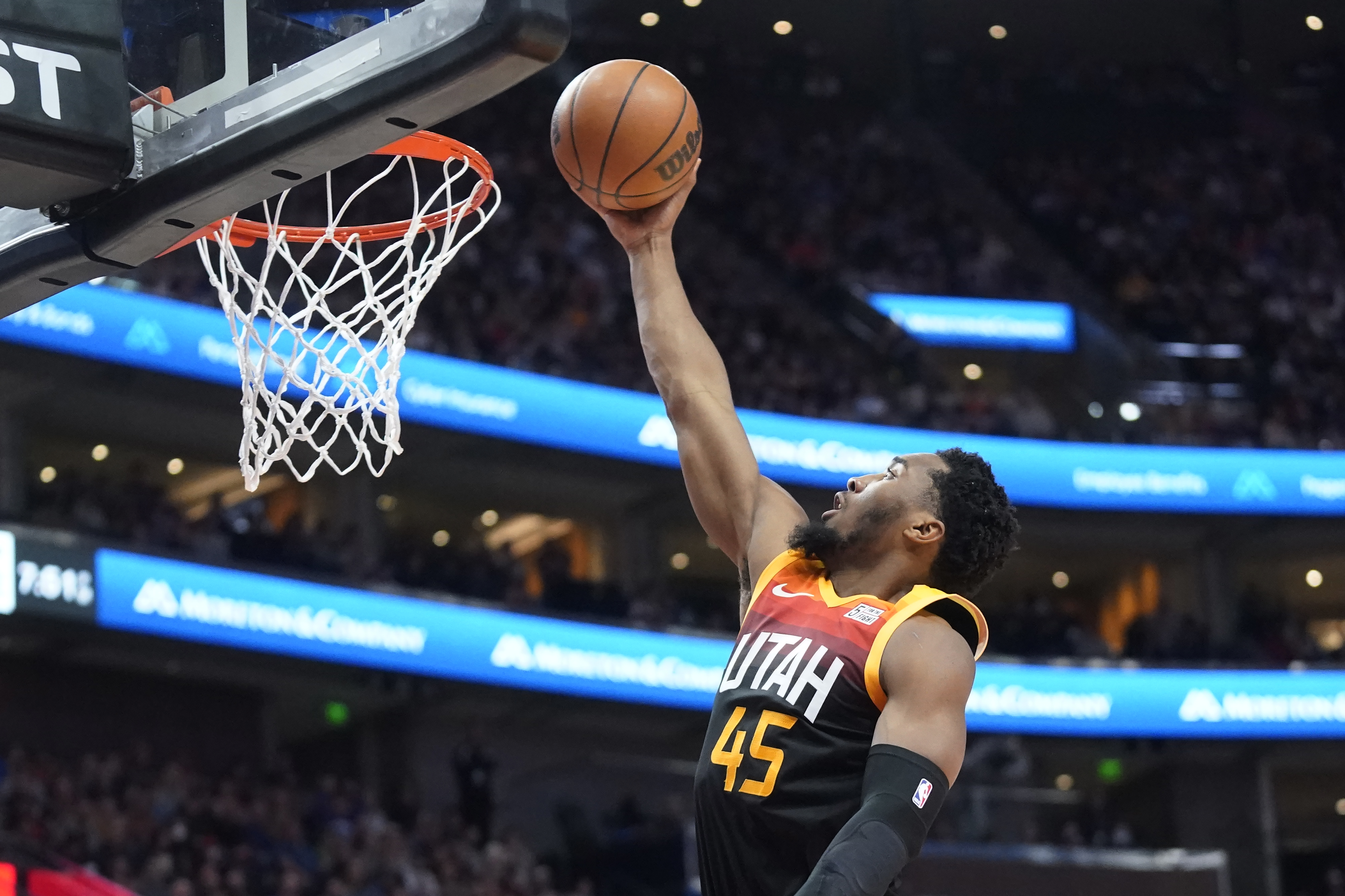 Utah Jazz guard Donovan Mitchell goes to the basket against the Chicago Bulls during the first half of an NBA basketball game Wednesday, March 16, 2022, in Salt Lake City.
