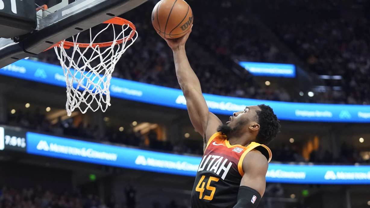 Utah Jazz guard Donovan Mitchell goes to the basket against the Chicago Bulls during the first half of an NBA basketball game Wednesday, March 16, 2022, in Salt Lake City.