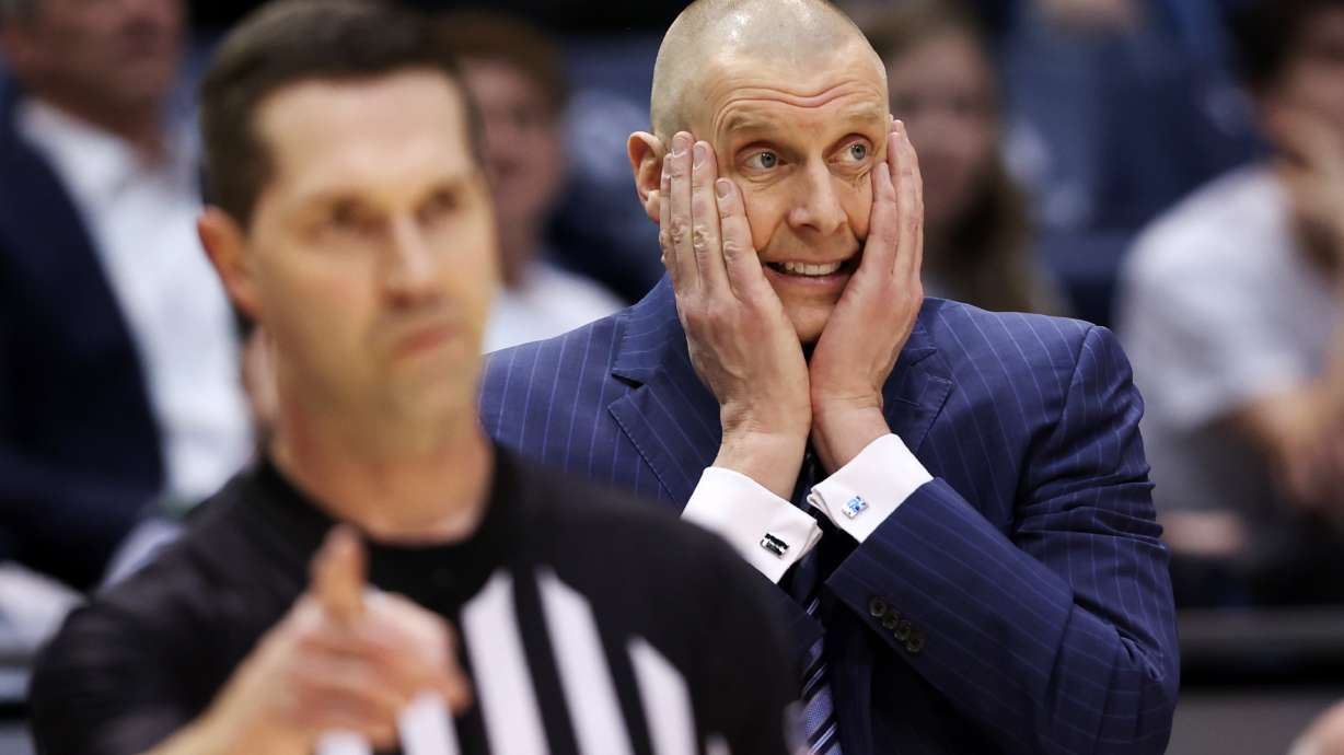 Brigham Young Cougars head coach Mark Pope, reacts during play as BYU and Long Beach State play in the NIT at the Marriott Center in Provo Utah on Wednesday, March 16, 2022. BYU won 93-72.