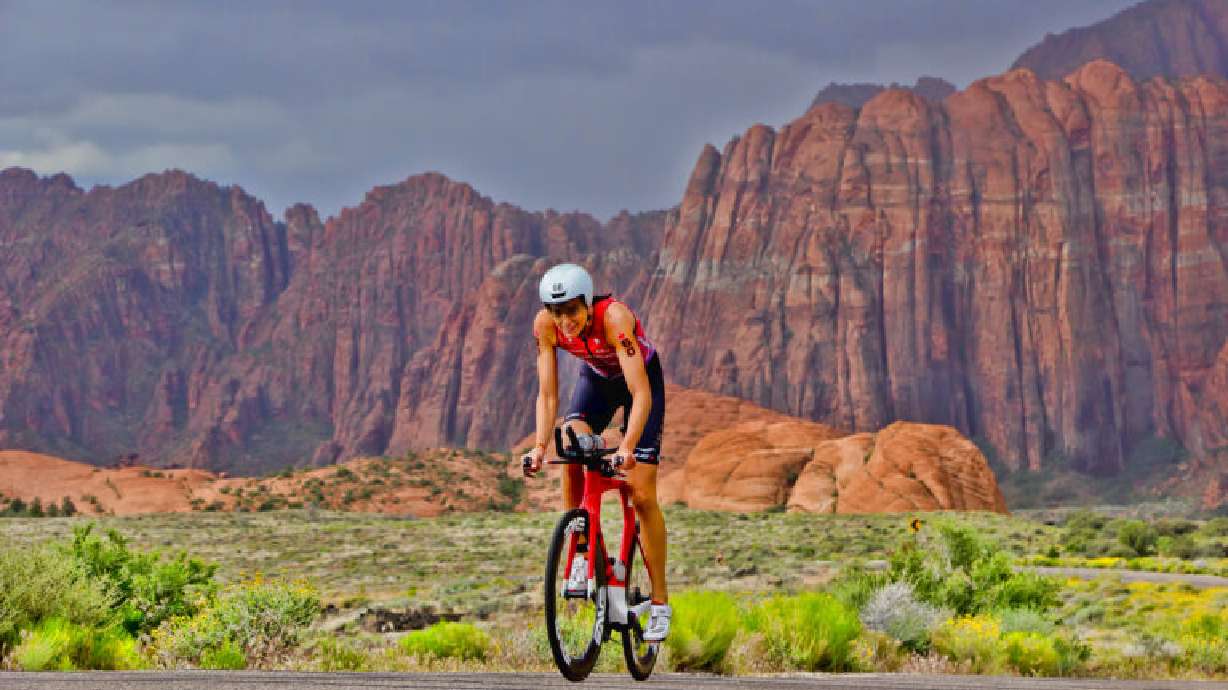 Ironman triathlete Heather Wurtele cycling through Snow Canyon State Park, May 7, 2016.