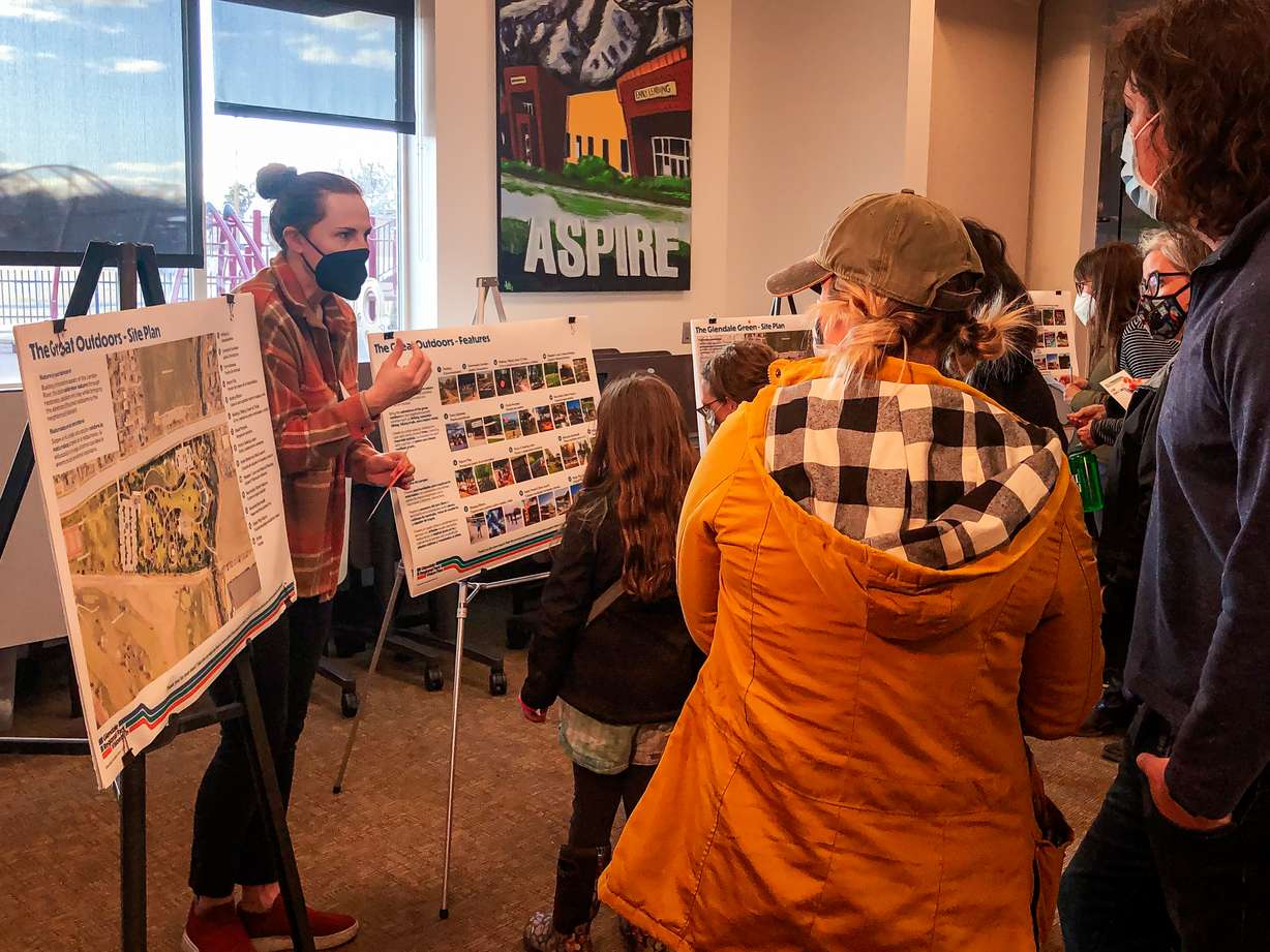 Katherine Maus, a public lands planner for Salt Lake City Park & Public Lands, speaks with residents about the future Glendale Regional Park during an open house at the Glendale-Mountain View Community Center on March 16. The new park is slated to open in 2024.