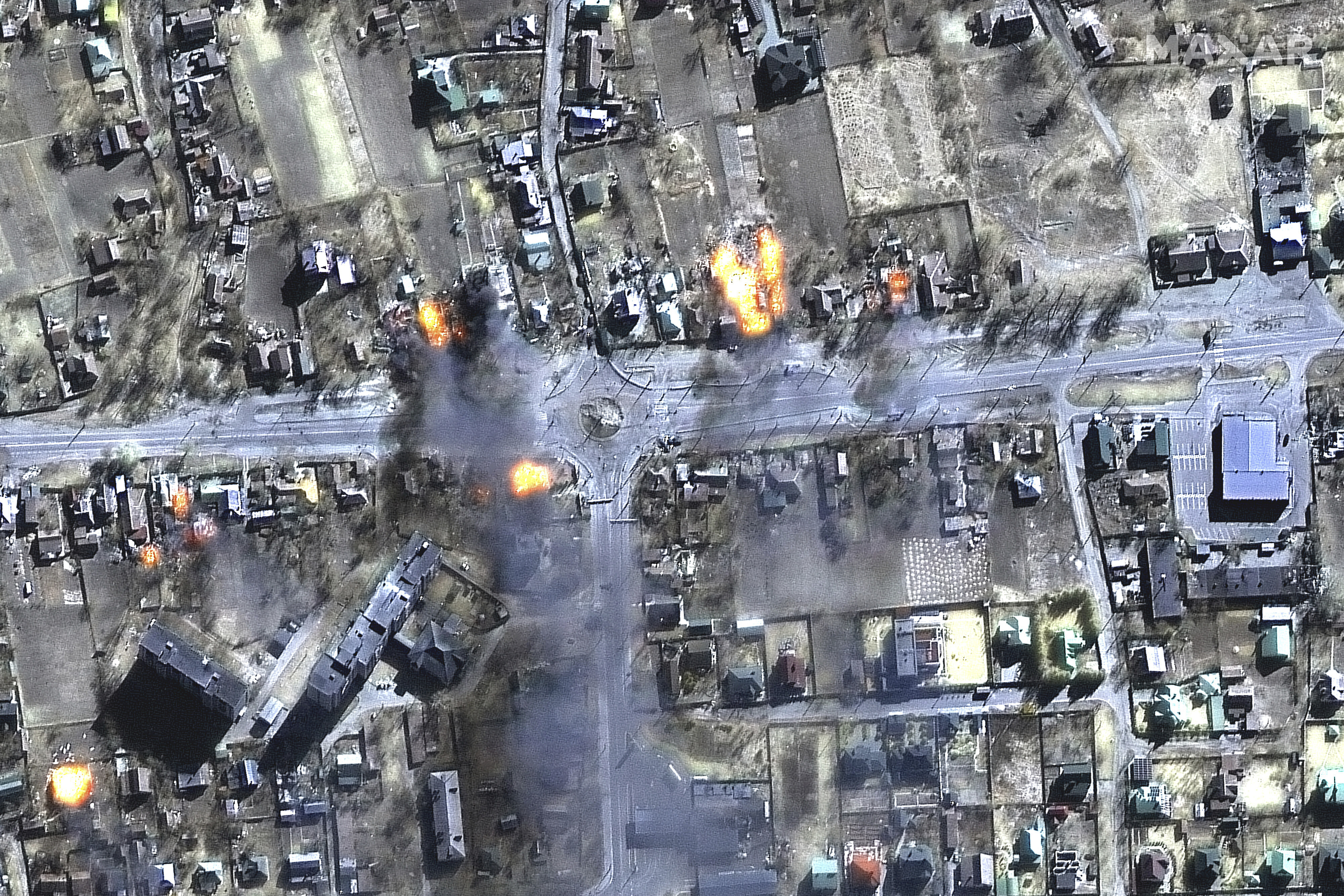 This satellite image provided by Maxar Technologies shows burning buildings in a residential area in northeast Chernihiv, Ukraine, on Wednesday. An Idaho resident was killed in the attack.