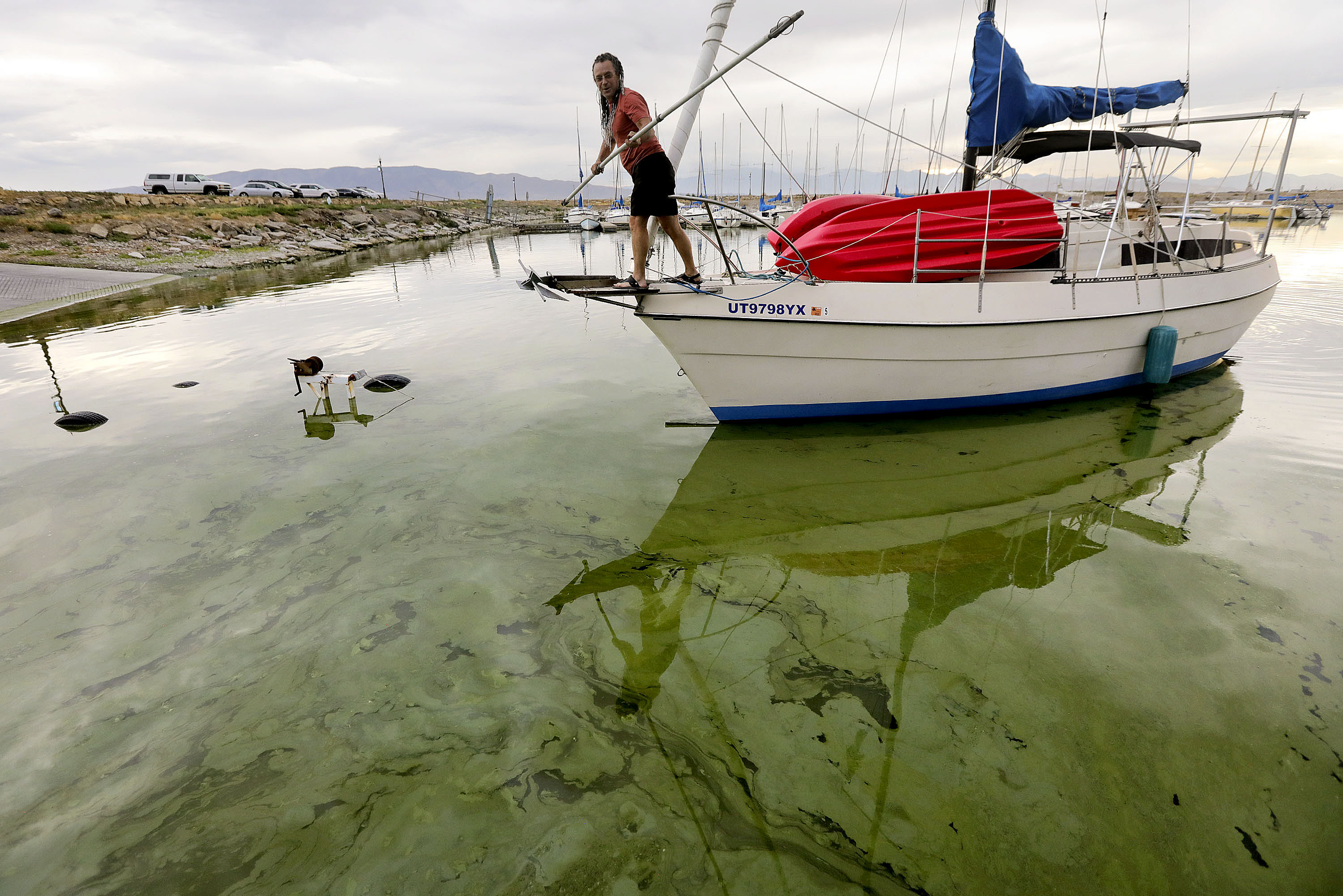 Jeff Mortensen guides a boat on Utah Lake toward a boat ramp in Vineyard on July 19, 2021. Archeologists say Utah Lake has been an important part of life for thousands of years — and know this through rock art and other artifacts left behind.