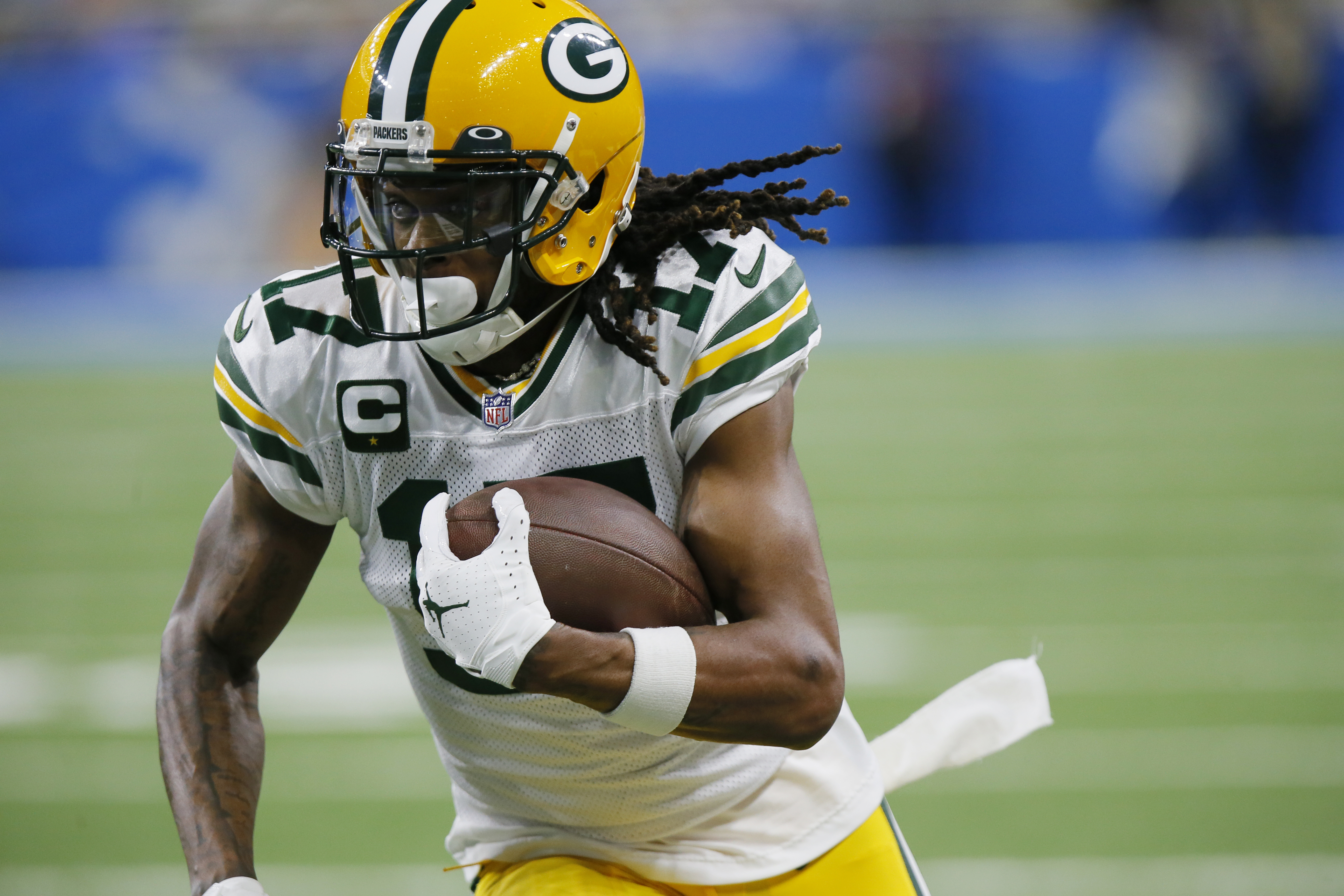 FILE - Green Bay Packers wide receiver Davante Adams runs during the first half of the team's NFL football game against the Detroit Lions on Jan. 9, 2022, in Detroit. The Las Vegas Raiders have traded two draft picks to Green Bay for All-Pro receiver Adams. A person familiar with the move said Thursday, March 17, the Raiders are sending the No. 22 overall pick in April's draft and another draft pick to the Packers to reunited Adams with his college quarterback Derek Carr. The person spoke on condition of anonymity because the deal hadn't been announced. 