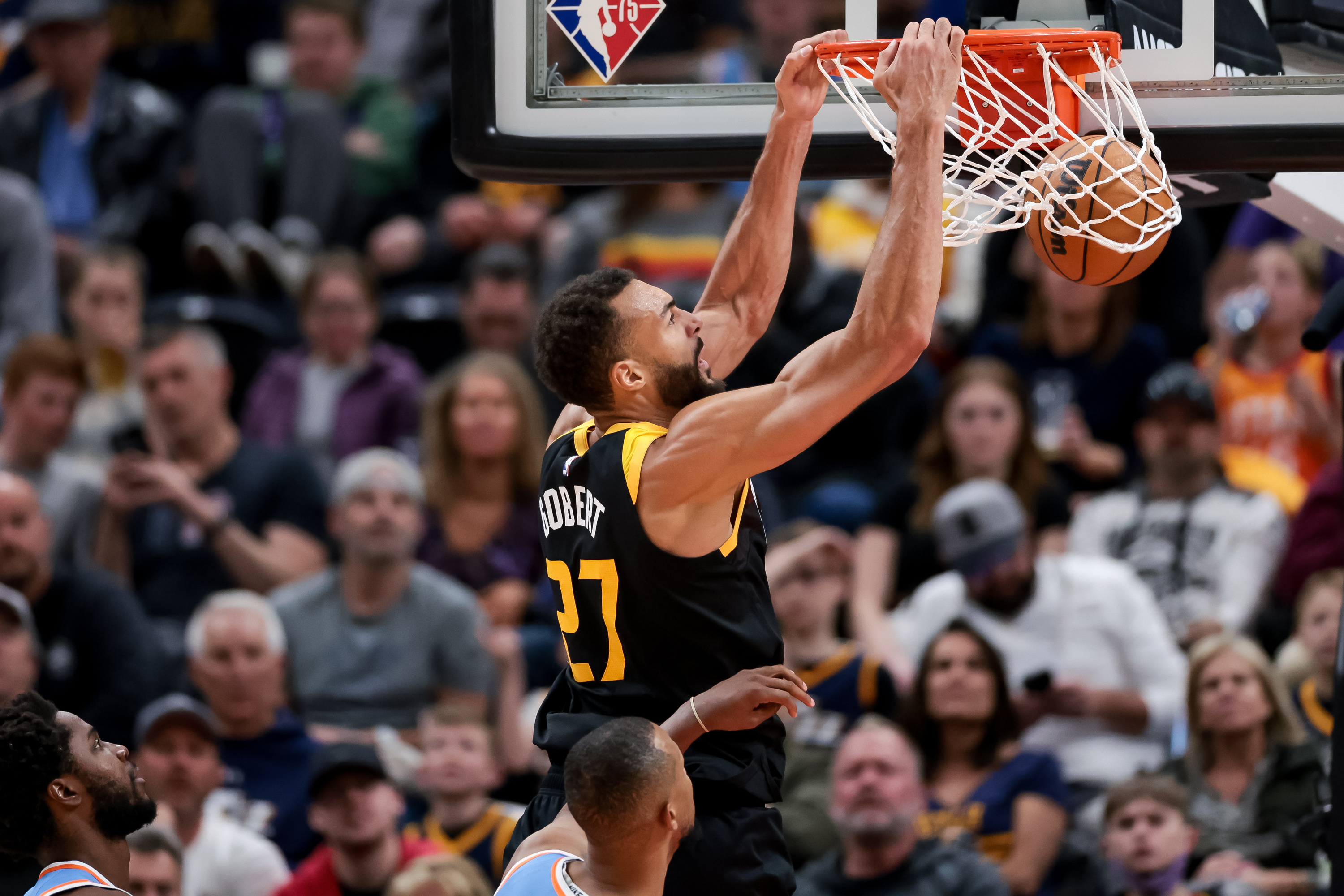 Utah Jazz center Rudy Gobert (27) dunks during the game against the LA Clippers at Vivint Arena in Salt Lake City on Friday, March 18, 2022.