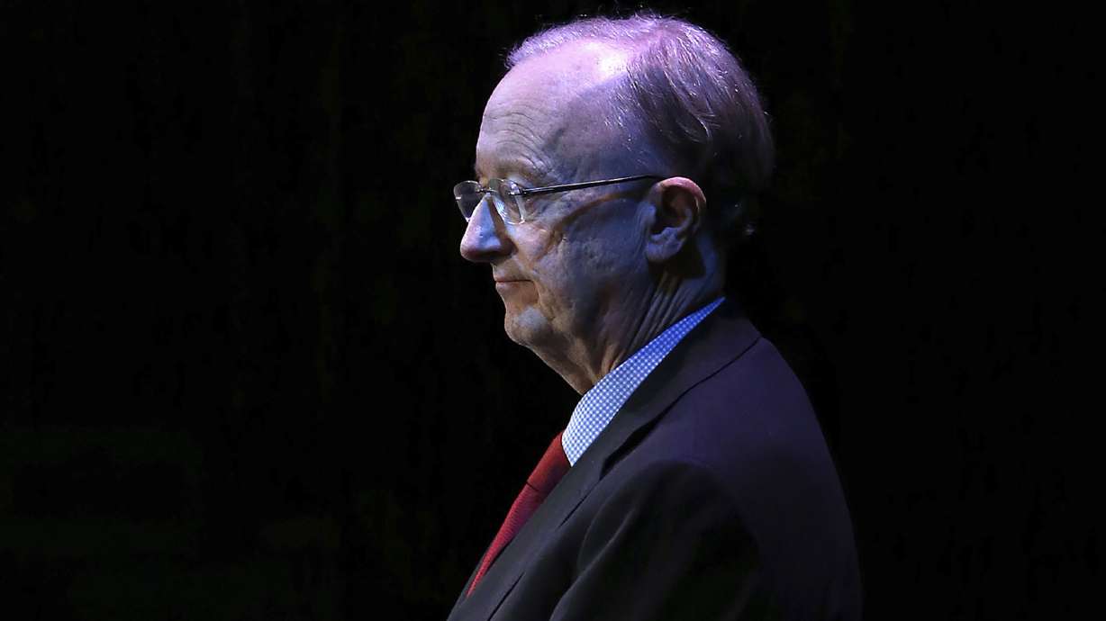 FILE - Hall of Fame journalist John Clayton presents the 2016 Male Sports Star of the Year Award during the MTRWestern 82nd Annual Sports Star of the Year Awards, Feb. 8, 2017, at the Paramount Theater. Clayton died Friday, March 18, 2022, following a short illness. He was 67.