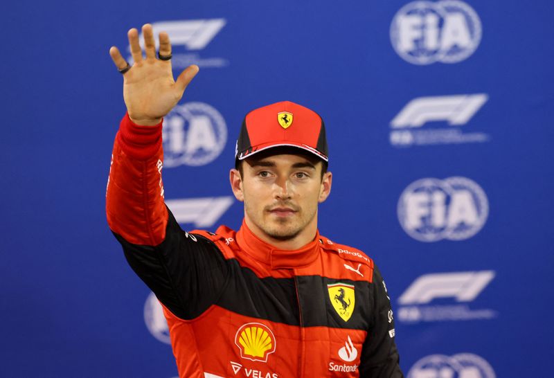 Formula One F1 - Bahrain Grand Prix - Bahrain International Circuit, Sakhir, Bahrain - March 19, 2022 Ferrari's Charles Leclerc celebrates pole position after qualifying.