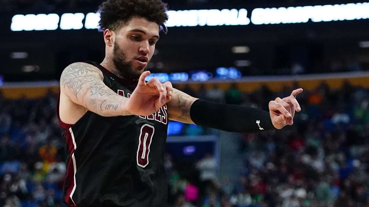 New Mexico State guard Teddy Allen reacts during the second half of the team's college basketball game against Connecticut in the first round of the NCAA men's tournament Thursday, March 17, 2022, in Buffalo, N.Y.