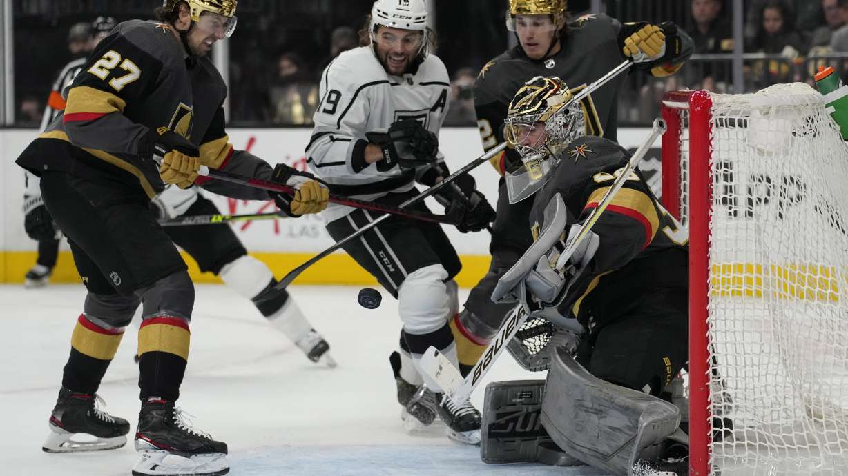 Vegas Golden Knights goaltender Logan Thompson (36) blocks a shot by the Los Angeles Kings during the third period of an NHL hockey game Saturday, March 19, 2022, in Las Vegas.