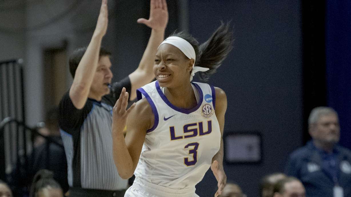 LSU guard Khayla Pointer (3) celebrates a 3-point basket against Jackson State in the first half of a women's college basketball game in the first round of an NCAA tournament, Saturday, March 19, 2022, in Baton Rouge, La.