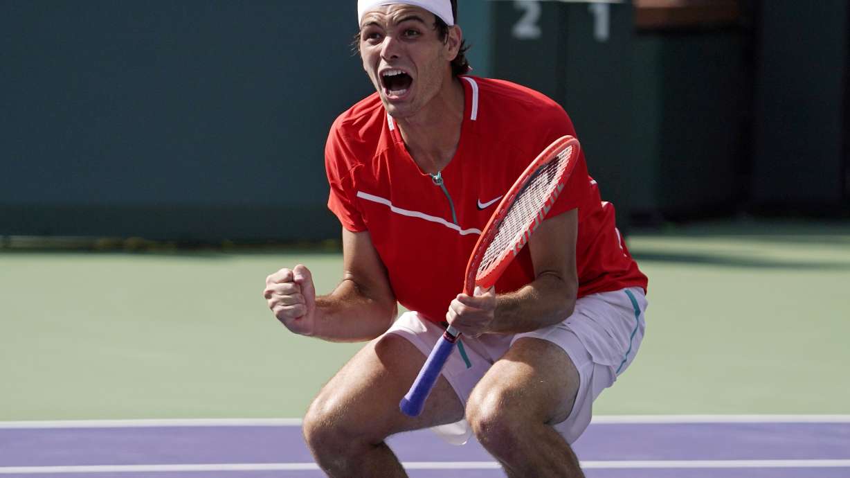 Taylor Fritz reacts during his men's singles semifinals match against Andrey Rublev, of Russia, at the BNP Paribas Open tennis tournament Saturday, March 19, 2022, in Indian Wells, Calif.