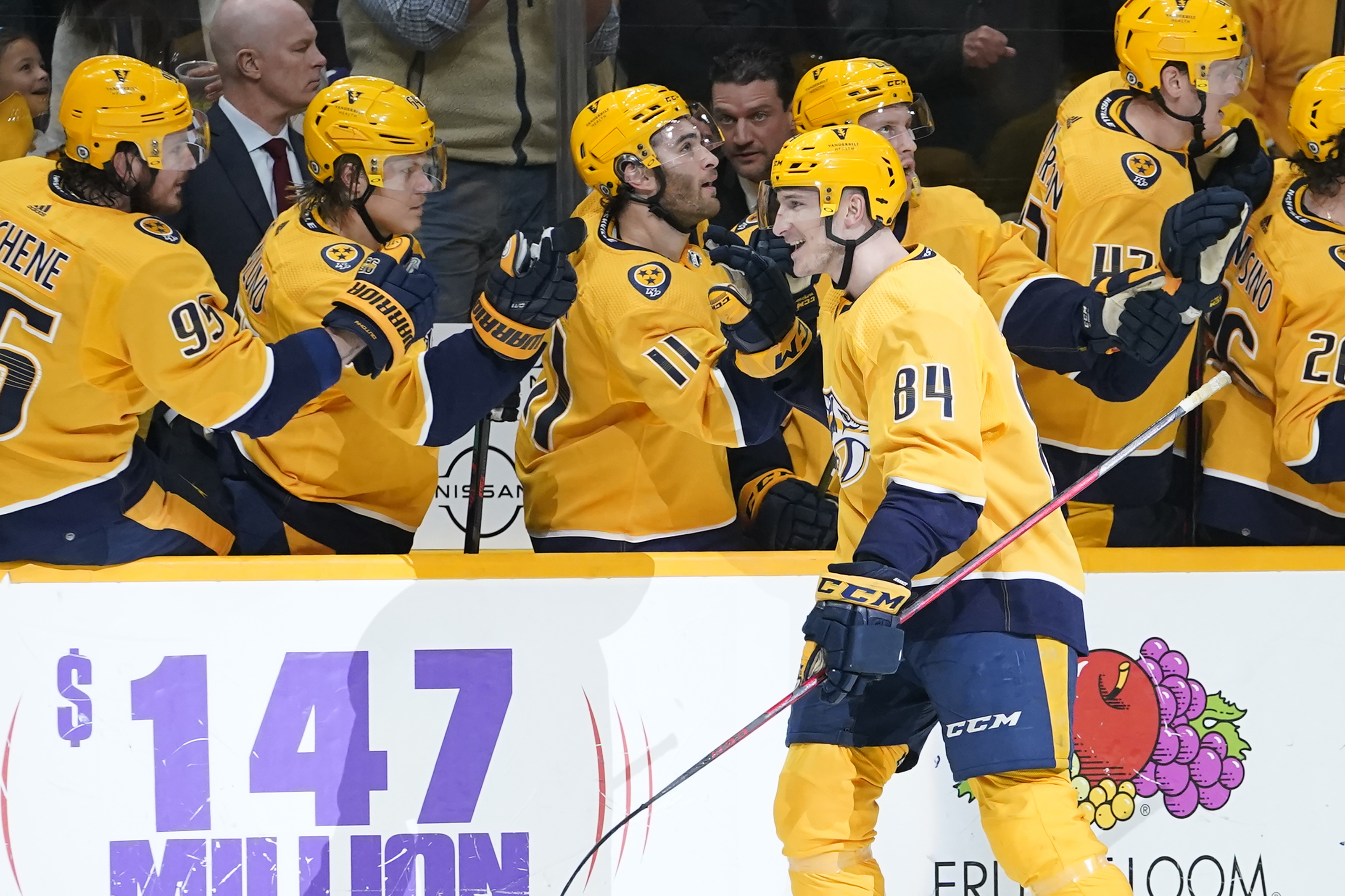 Nashville Predators' Tanner Jeannot (84) is congratulated after scoring a goal against the Toronto Maple Leafs in the first period of an NHL hockey game Saturday, March 19, 2022, in Nashville, Tenn. 