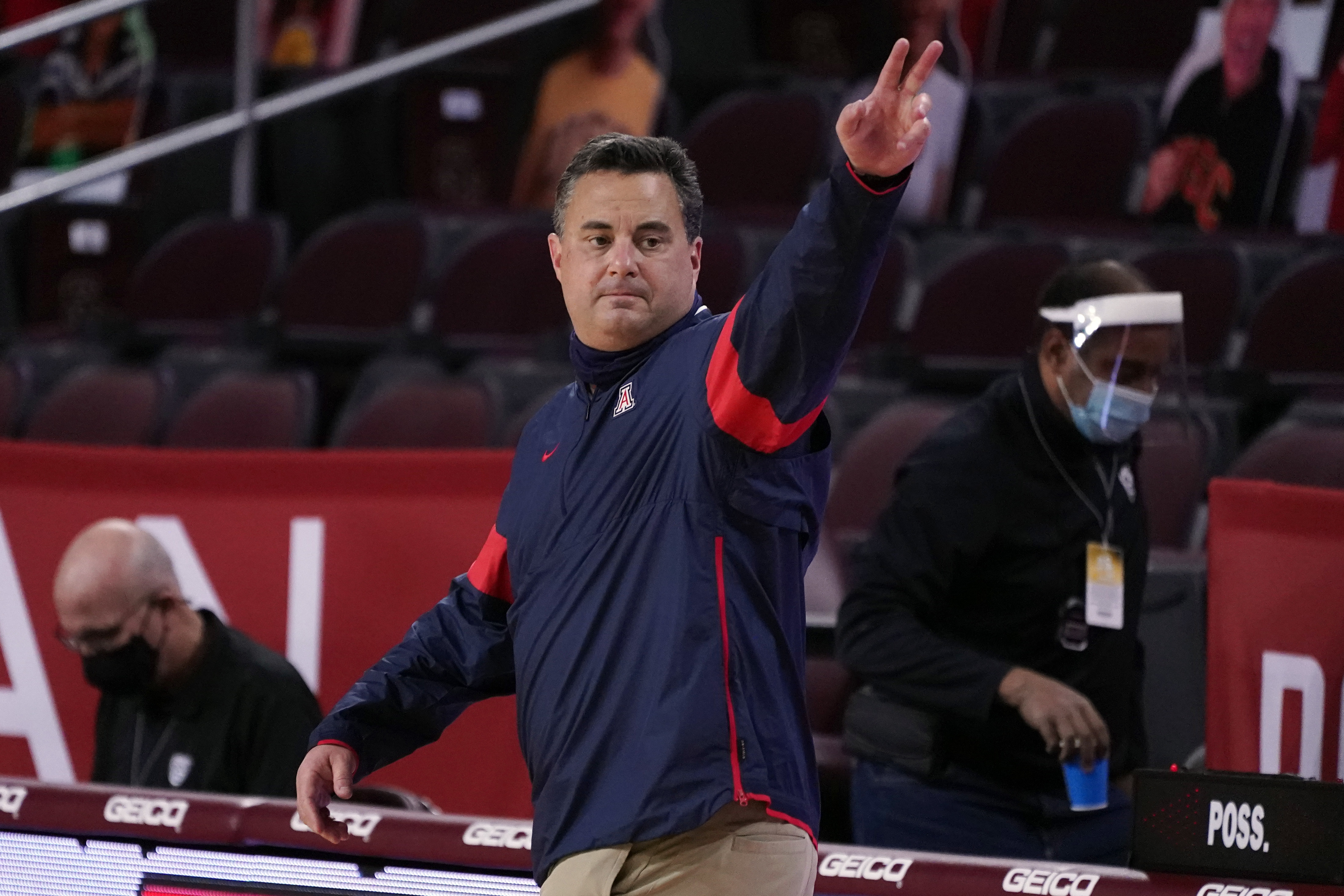 Arizona head coach Sean Miller waves after a win over Southern California during an NCAA college basketball game Feb. 20, 2021, in Los Angeles.  Former Arizona coach Miller returned to Xavier on Saturday, March 19, 2022, less than a year after the Wildcats fired him amid an ongoing NCAA investigation that has stretched nearly five years. 