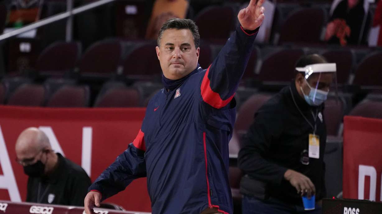 Arizona head coach Sean Miller waves after a win over Southern California during an NCAA college basketball game Feb. 20, 2021, in Los Angeles. Former Arizona coach Miller returned to Xavier on Saturday, March 19, 2022, less than a year after the Wildcats fired him amid an ongoing NCAA investigation that has stretched nearly five years.