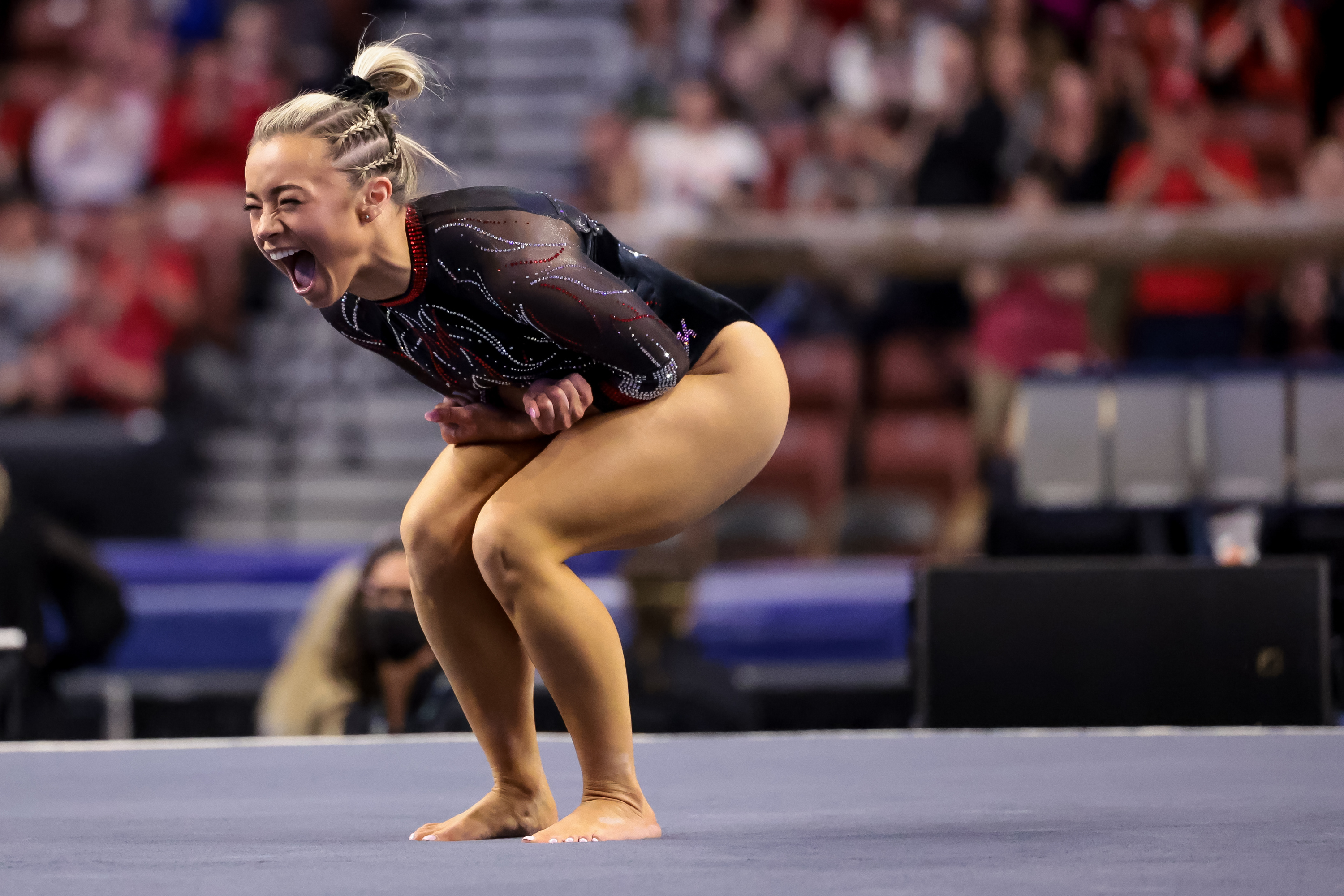 Utah’s Sydney Soloski celebrates at the end of her floor routine during the Pac-12 women’s gymnastics championship at the Maverik Center in West Valley City on Saturday, March 19, 2022.