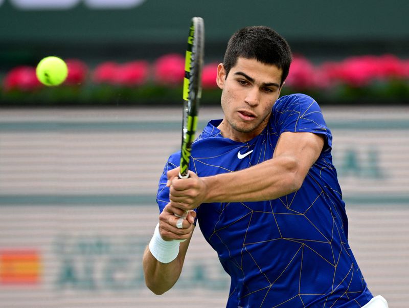 Mar 19, 2022; Indian Wells, CA, USA; Carlos Alcaraz (ESP) plays against Rafael Nadal (ESP) in their semifinal match in the BNP Paribas Open at the Indian Wells Tennis Garden.