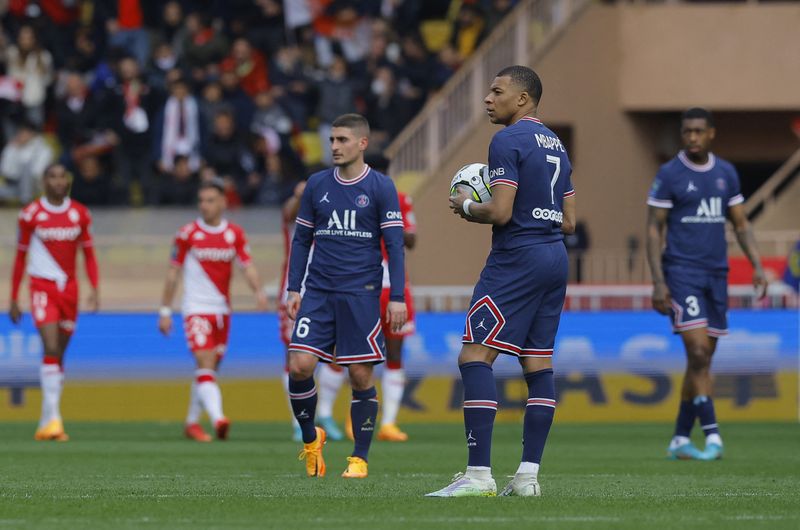 Soccer Football - Ligue 1 - AS Monaco v Paris St Germain - Stade Louis II, Monaco - March 20, 2022 Paris St Germain's Kylian Mbappe and Marco Verratti look dejected after AS Monaco's Kevin Volland scores their second goal