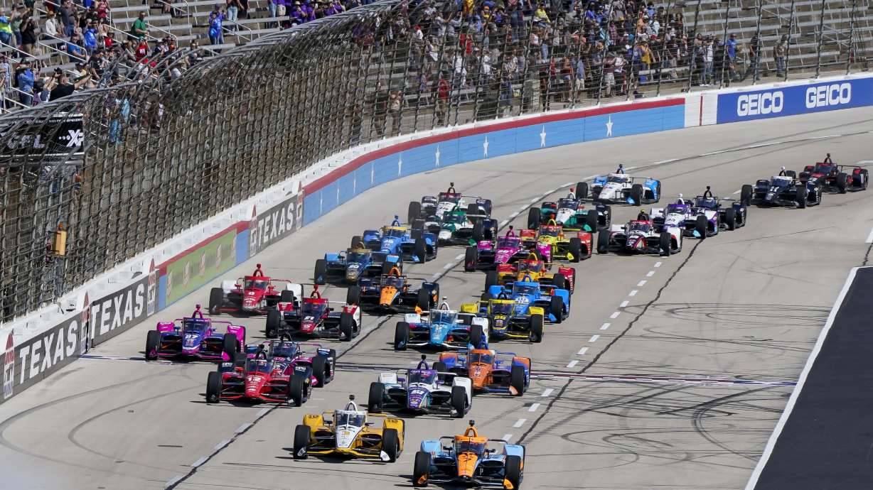 Racers vie for position at the beginning of the NTT IndyCar Series XPEL 375 at Texas Motor Speedway in Fort Worth, Texas, on Sunday, March 20, 2022.