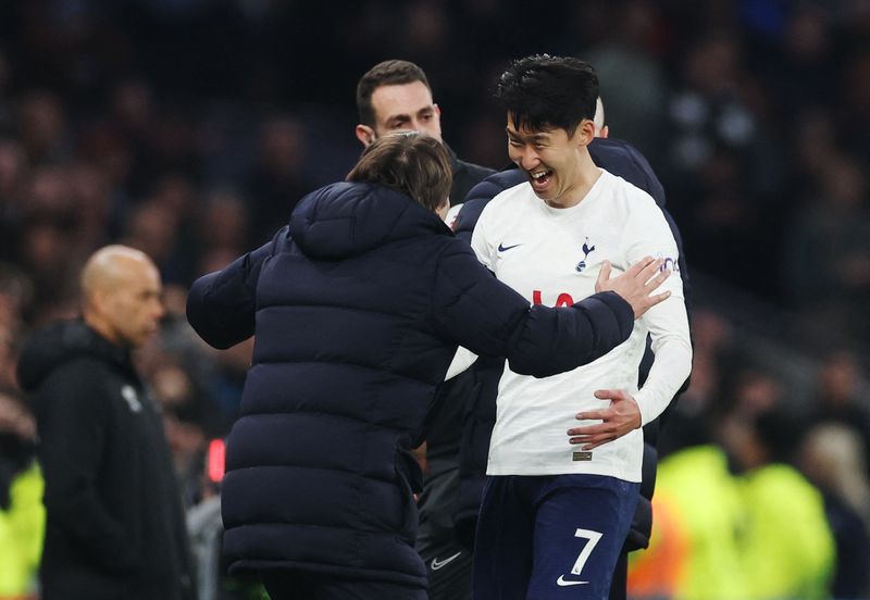 Soccer Football - Premier League - Tottenham Hotspur v West Ham United - Tottenham Hotspur Stadium, London, Britain - March 20, 2022 Tottenham Hotspur's Son Heung-min with manager Antonio Conte after being substituted Action Images via Reuters/Paul Childs