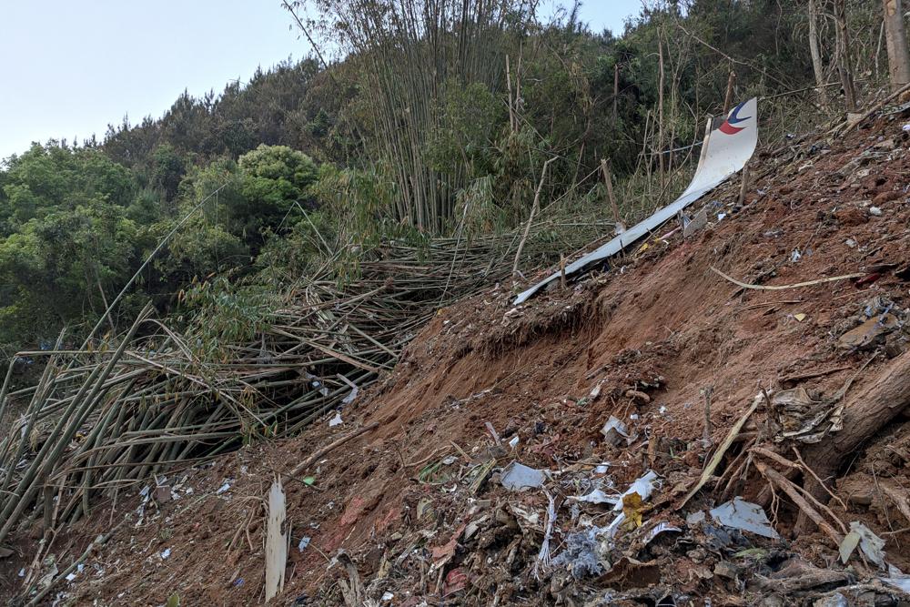 A piece of wreckage of the China Eastern's flight MU5735 is seen after it crashed on the mountain in Tengxian County, south China's Guangxi Zhuang Autonomous Region on Monday. A China Eastern Boeing 737-800 with 132 people on board crashed in a remote mountainous area of southern China on Monday.