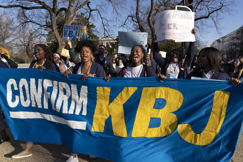 Supporters of the confirmation of Judge Ketanji Brown Jackson rally outside of the Supreme Court on Capitol Hill in Washington, Monday, March 21, 2022. The Senate Judiciary Committee begins historic confirmation hearings Monday for Judge Ketanji Brown Jackson, who would be the first Black woman on the Supreme Court.