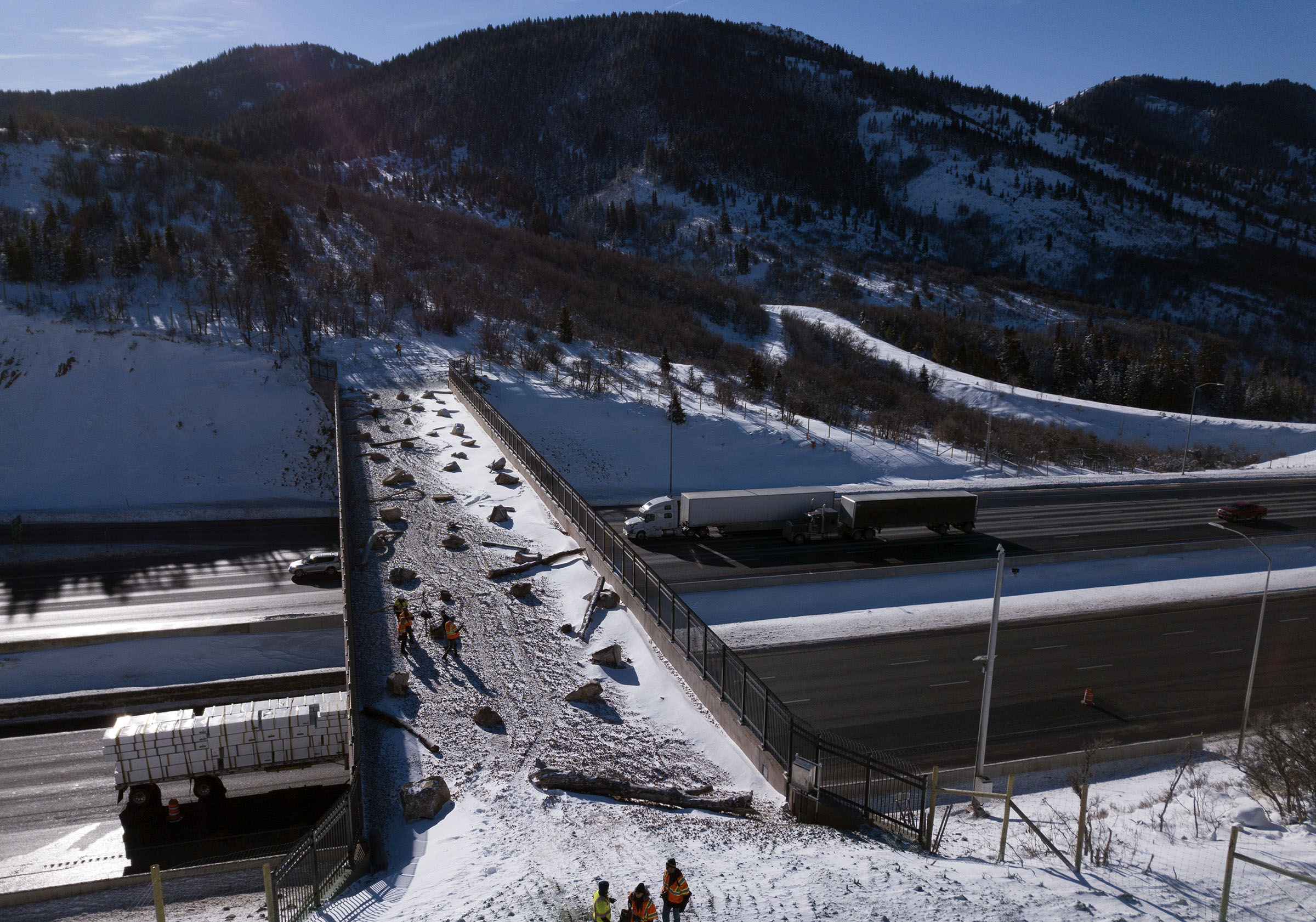 Traffic on I-80 passes under a wildlife crossing near Parleys Summit in Parleys Canyon on Thursday, Dec. 13, 2018. A bill that Gov. Spencer Cox signed Monday requires the Utah Department of Transportation to include wildlife mitigation impacts in its annual report to the road safety report.