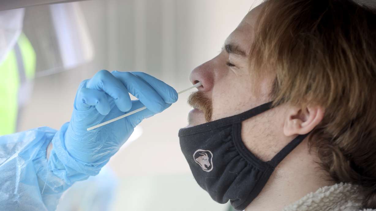 Daniel Martin gets tested for COVID-19 at a Nomi Health testing site outside of the Utah Department of Health building in Salt Lake City on March 16. The Utah Department of Health reported 38 deaths and 109 new COVID-19 cases on Tuesday.