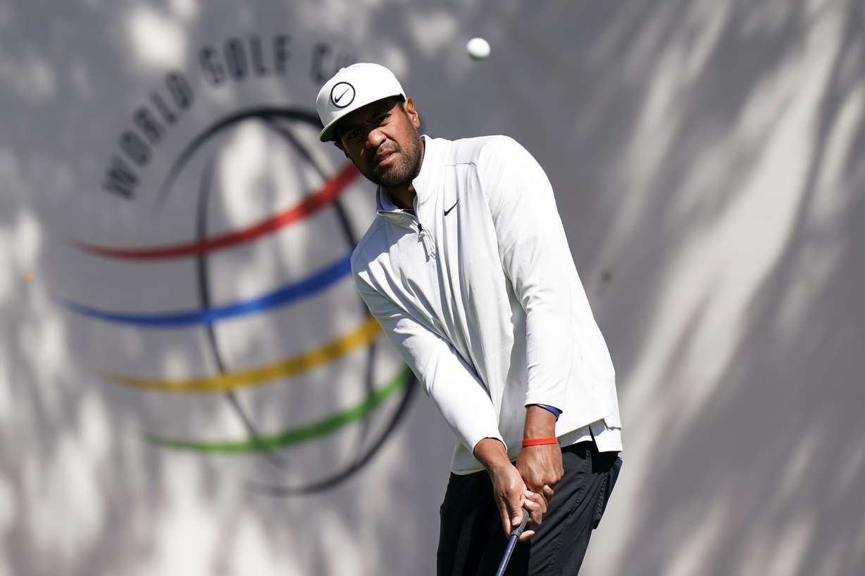 Tony Finau chips during practice for the Dell Technologies Match Play Championship golf tournament, Tuesday, March 22, 2022, in Austin, Texas.