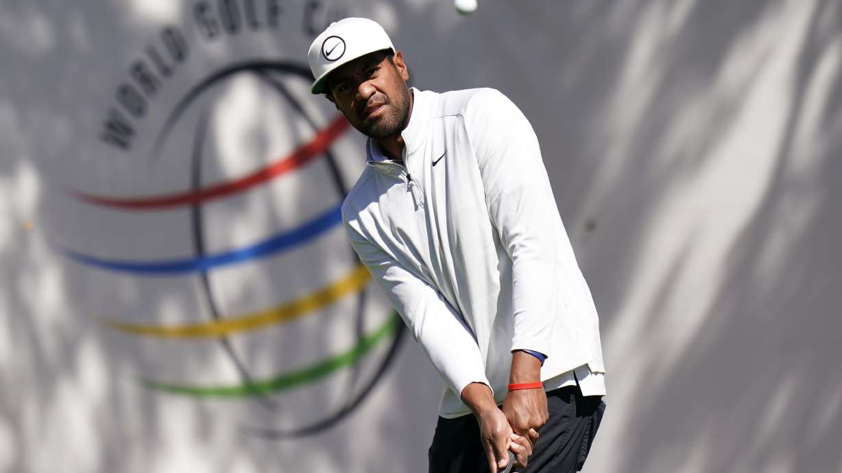 Tony Finau chips during practice for the Dell Technologies Match Play Championship golf tournament, Tuesday, March 22, 2022, in Austin, Texas.