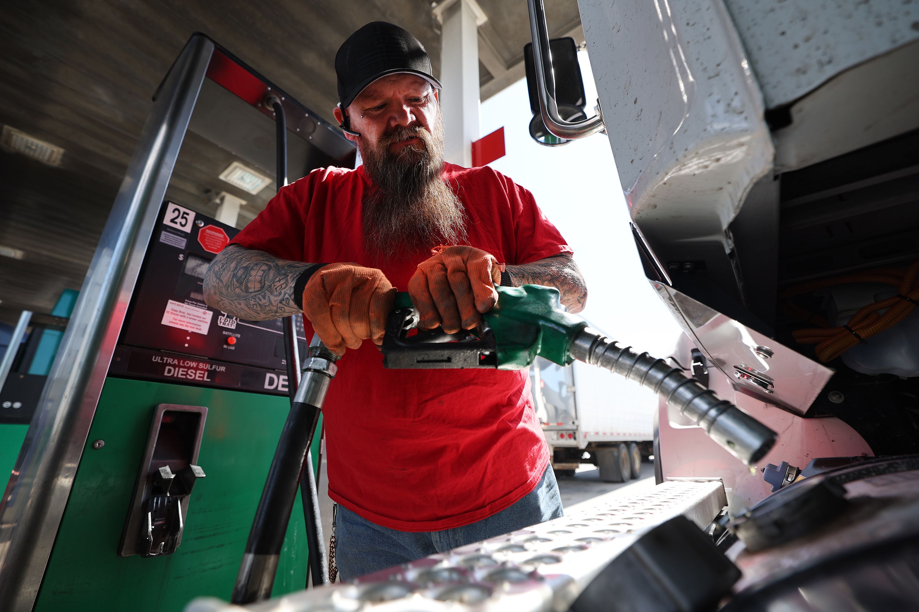 John Reese, a driver for Jets Logistics, fills one of his semitruck’s tanks in Salt Lake City on Tuesday.
