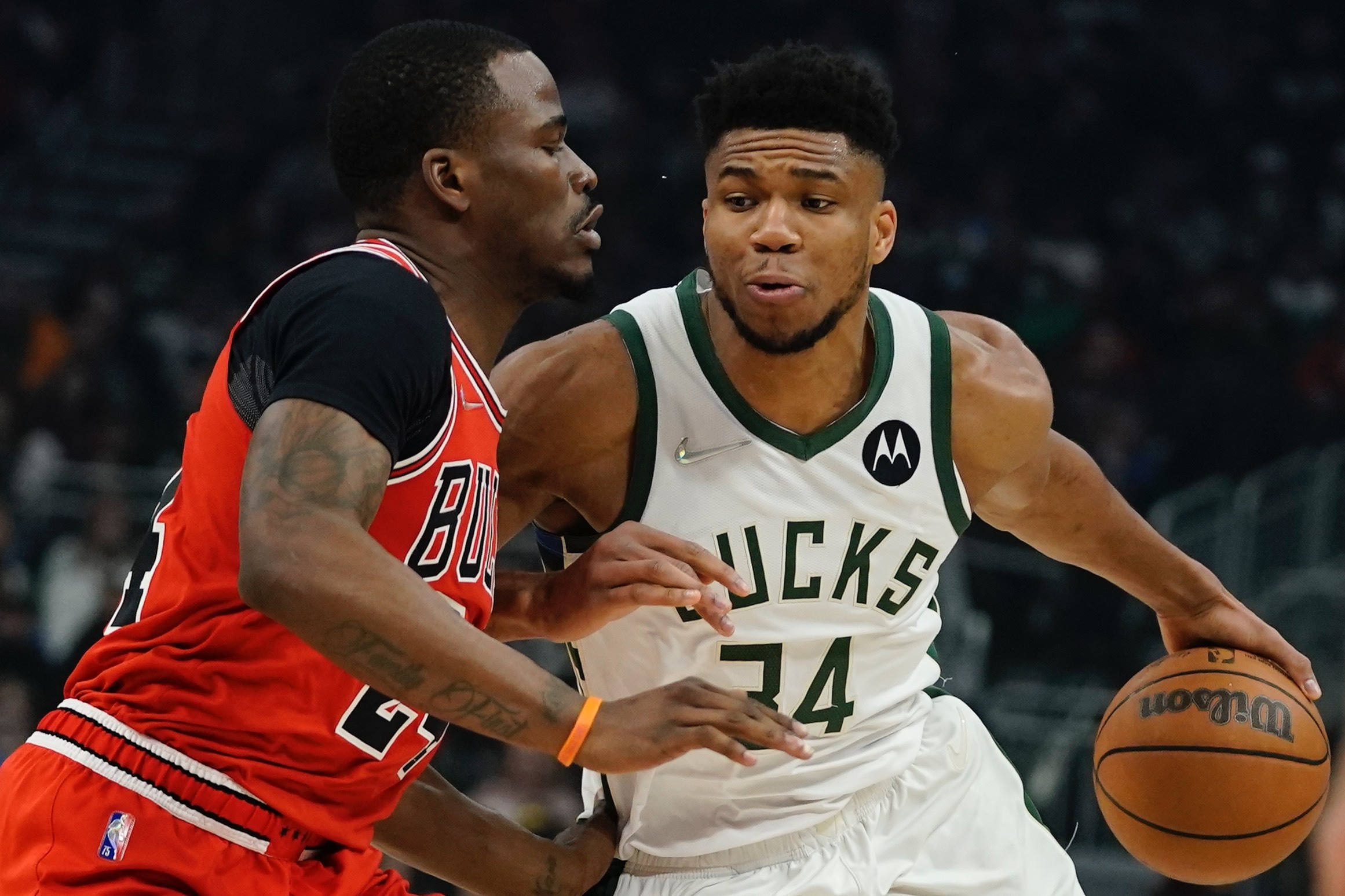 Milwaukee Bucks' Giannis Antetokounmpo drives past Chicago Bulls' Javonte Green during the first half of an NBA basketball game Tuesday, March 22, 2022, in Milwaukee . 