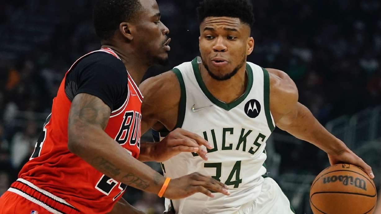 Milwaukee Bucks' Giannis Antetokounmpo drives past Chicago Bulls' Javonte Green during the first half of an NBA basketball game Tuesday, March 22, 2022, in Milwaukee .