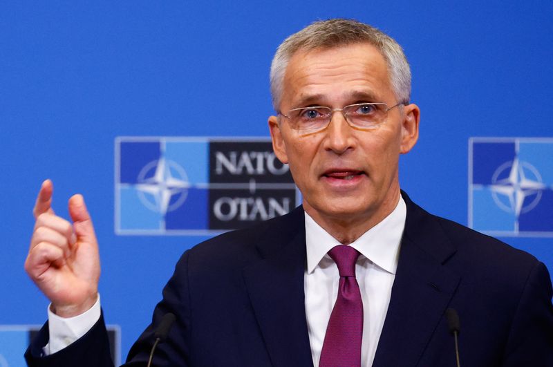 NATO Secretary-General Jens Stoltenberg gestures during a news conference on the eve of a NATO summit, amid Russia's invasion of Ukraine, in Brussels, Belgium, Wednesday.