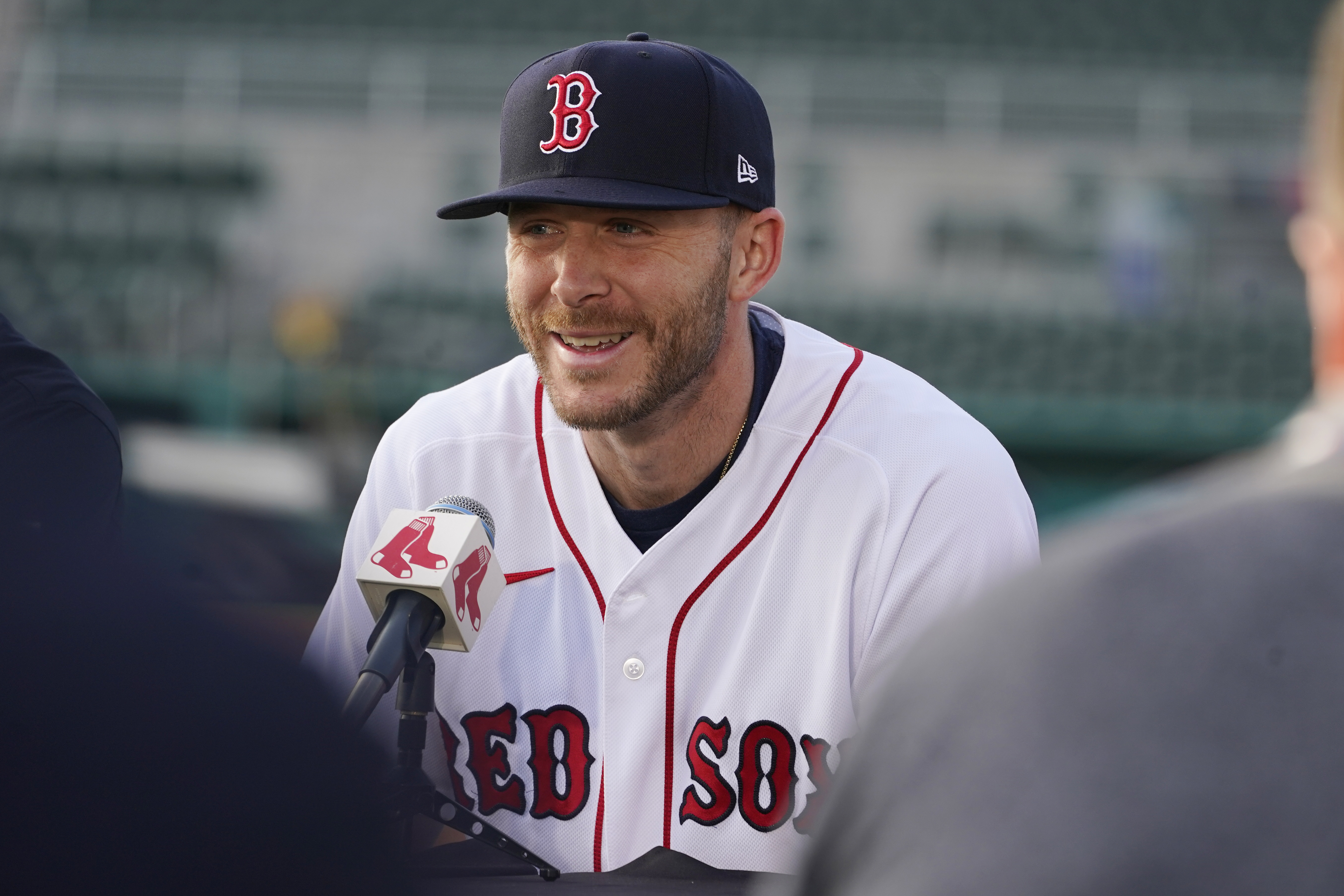 New Boston Red Sox shortstop Trevor Story smiles as he speaks to the media during a baseball press conference at JetBlue Park Wednesday, March 23, 2022, in Fort Myers, Fla. 