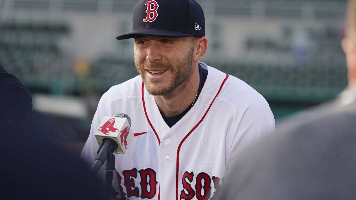 New Boston Red Sox shortstop Trevor Story smiles as he speaks to the media during a baseball press conference at JetBlue Park Wednesday, March 23, 2022, in Fort Myers, Fla.