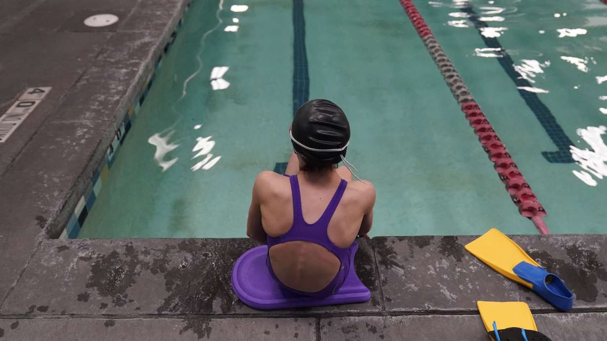 A proposed ban on transgender athletes playing female school sports in Utah would affect transgender girls like this 12-year-old swimmer seen at a pool in Utah on Feb. 22, 2021. Republican governors of two states this week vetoed the legislation to ban transgender players from girls' sports, but their decisions to buck the party's conservative wing could prove short-lived against a fired-up GOP base.