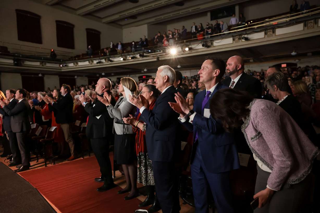 People stand and applaud during the inauguration of University of Utah President Taylor Randall at Kingsbury Hall on the U. campus in Salt Lake City on Wednesday.