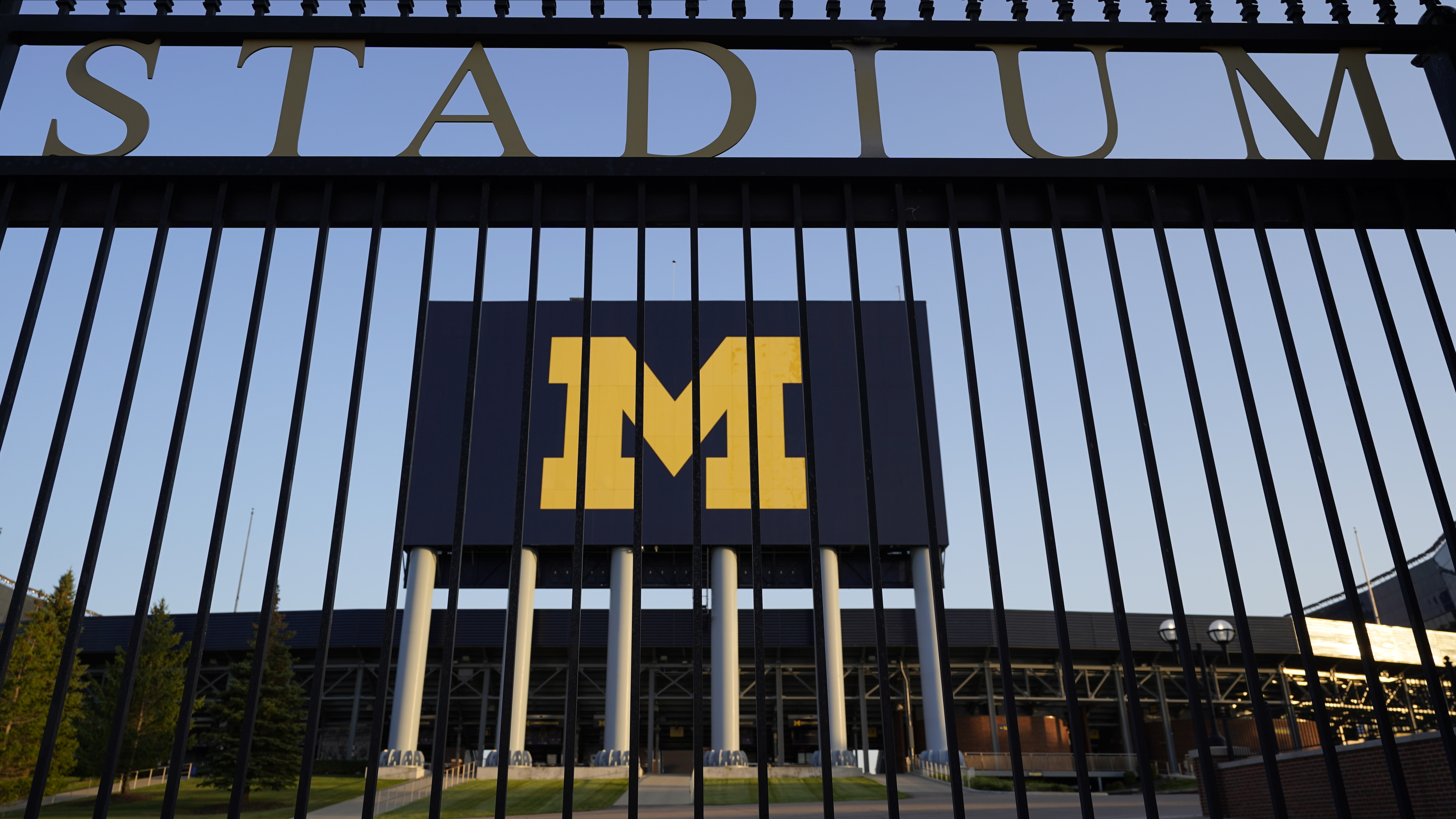 FILE - The University of Michigan football stadium is shown in Ann Arbor, Mich., Thursday, Aug. 13, 2020. The University of Michigan has reached an agreement to settle a lawsuit brought by students who sought to force changes in how the school protects the campus from sexual misconduct. The deal was filed in federal court on Thursday, March 24, 2022. 