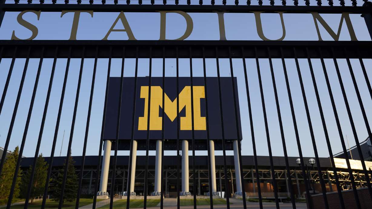 FILE - The University of Michigan football stadium is shown in Ann Arbor, Mich., Thursday, Aug. 13, 2020. The University of Michigan has reached an agreement to settle a lawsuit brought by students who sought to force changes in how the school protects the campus from sexual misconduct. The deal was filed in federal court on Thursday, March 24, 2022.