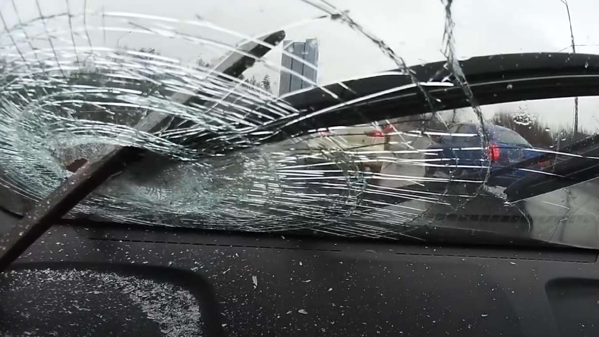 A metal rod lodged itself into an oncoming windshield in this video shot in Moscow, Russia, and posted on March 12, 2020.