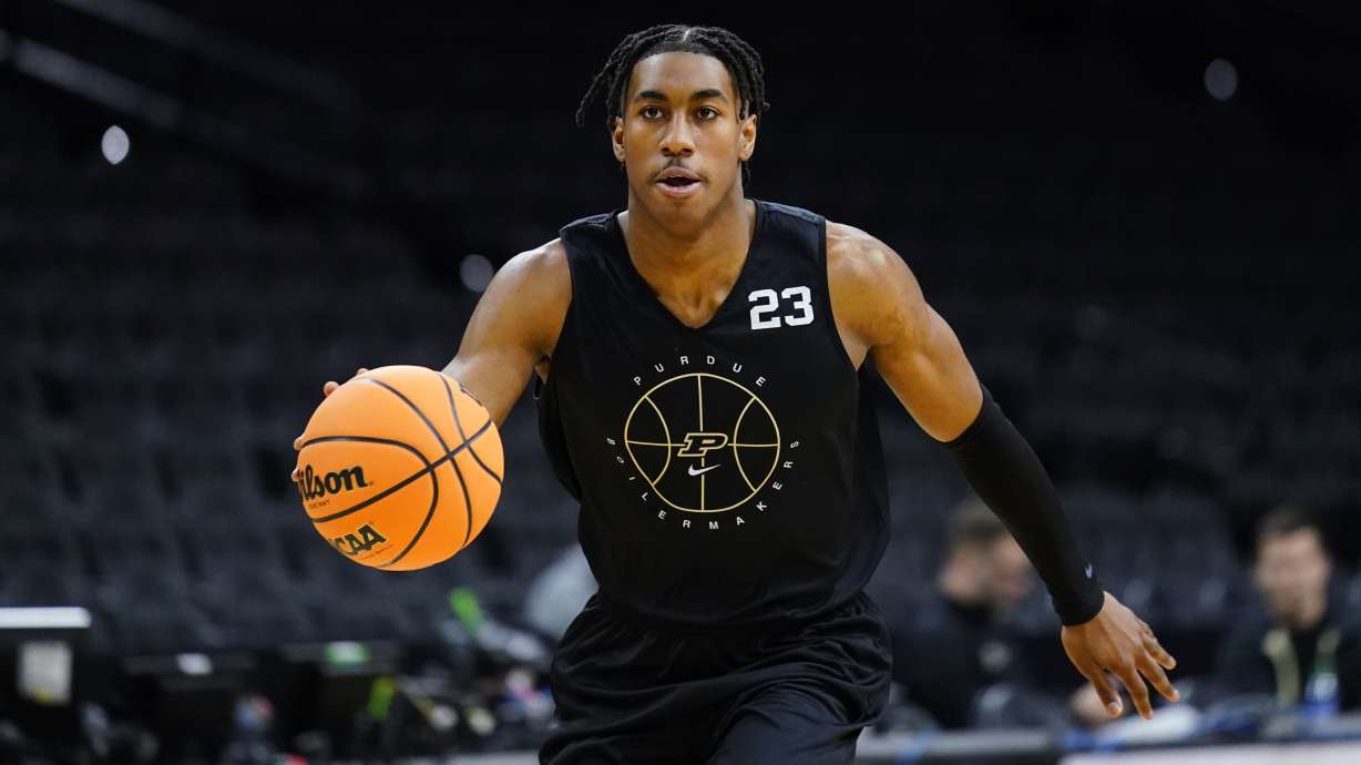 Purdue's Jaden Ivey dribbles during practice for the NCAA men's college basketball tournament, Thursday, March 24, 2022, in Philadelphia.