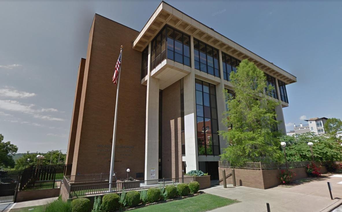The John Paul Hammerschmidt Federal Building in Fayetteville, Arkansas, houses the U.S. District Court for the Western District of Arkansas. Two Utah men are among the four accused of running an investment fraud scheme in Arkansas that allegedly bilked $16 million from victims.