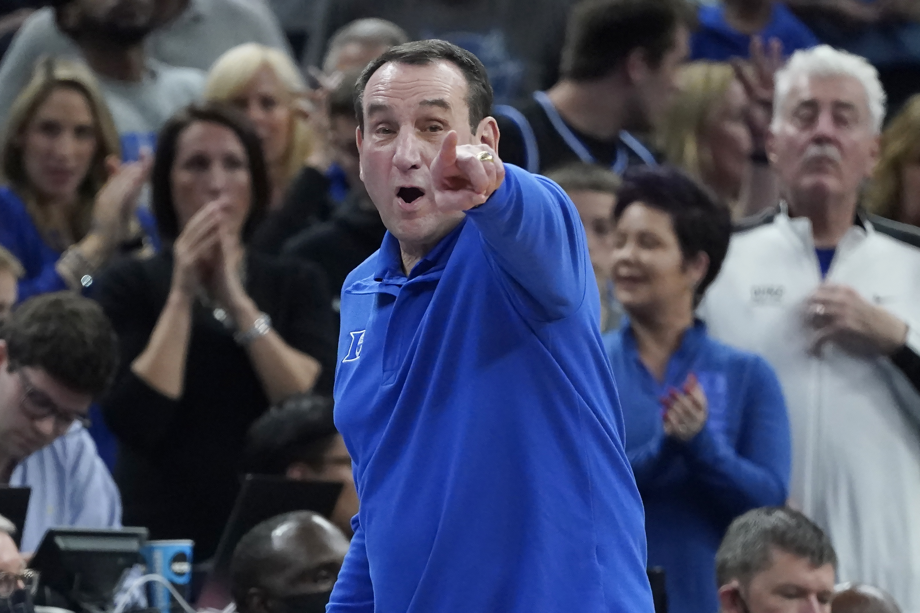 Duke head coach Mike Krzyzewski gestures toward players during the second half of his team's college basketball game against Texas Tech in the Sweet 16 round of the NCAA tournament in San Francisco, Thursday, March 24, 2022. 