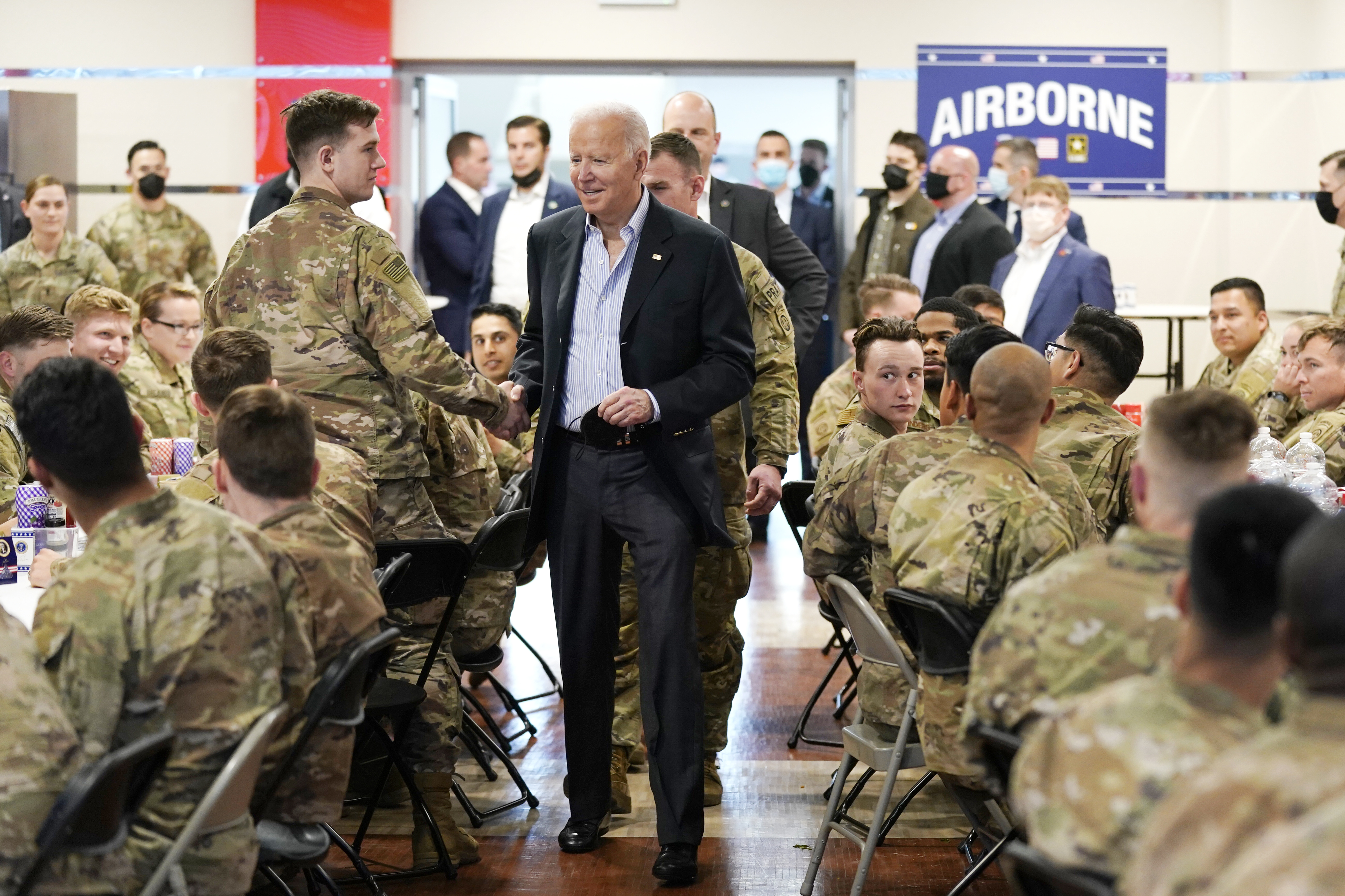 President Joe Biden visits with members of the 82nd Airborne Division at the G2A Arena on Friday in Jasionka, Poland.