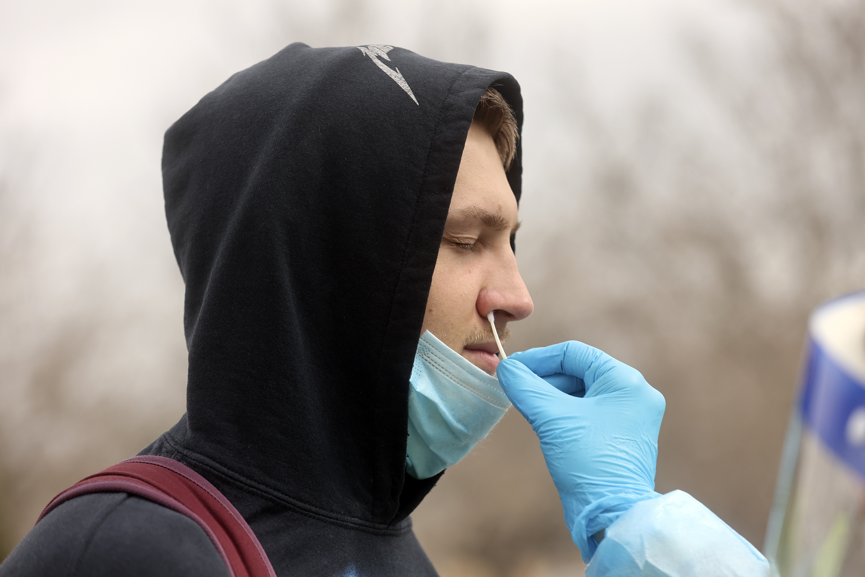 Mason Stoup gets tested for COVID-19 at a Nomi Health testing site outside of the Utah Department of Health building in Salt Lake City on Wednesday, March 16. On Friday, health officials reported reported 131 new COVID-19 cases and 22 deaths as they finished reporting deaths that were found through looking at previous death certificates.