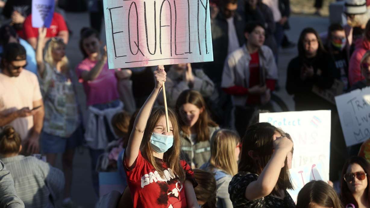 Ariel Peters holds an equality sign during a rally to support transgender youths outside of the Capitol in Salt Lake City on Thursday. The Utah Board of Higher Education gave unanimous support Friday to a resolution to affirm and support the Utah System of Higher Education’s LGBTQ+ community.